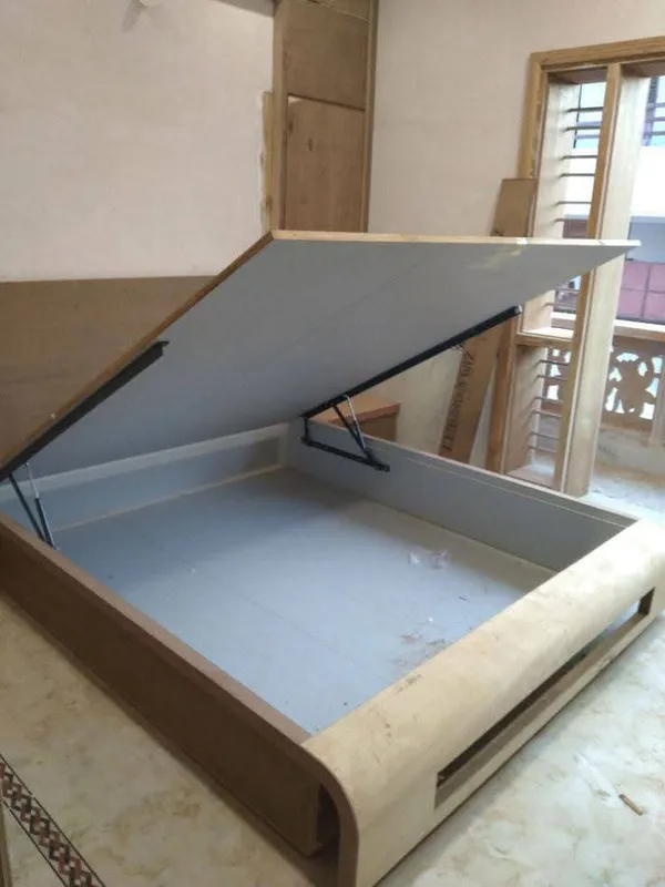 Custom corner vanity unit with concealed storage niches and warm ambient illumination