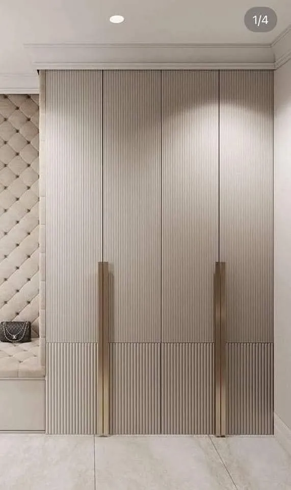 Under-counter cabinetry and legroom recess for custom kitchen breakfast island