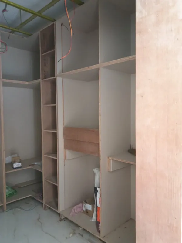 Accurate electrical backbox cutouts and flexible conduit routing behind bedhead wall panelling