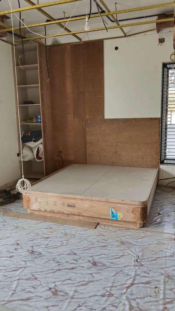 Overhead 4-compartment storage cabinet installed above cantilevered wooden study desk