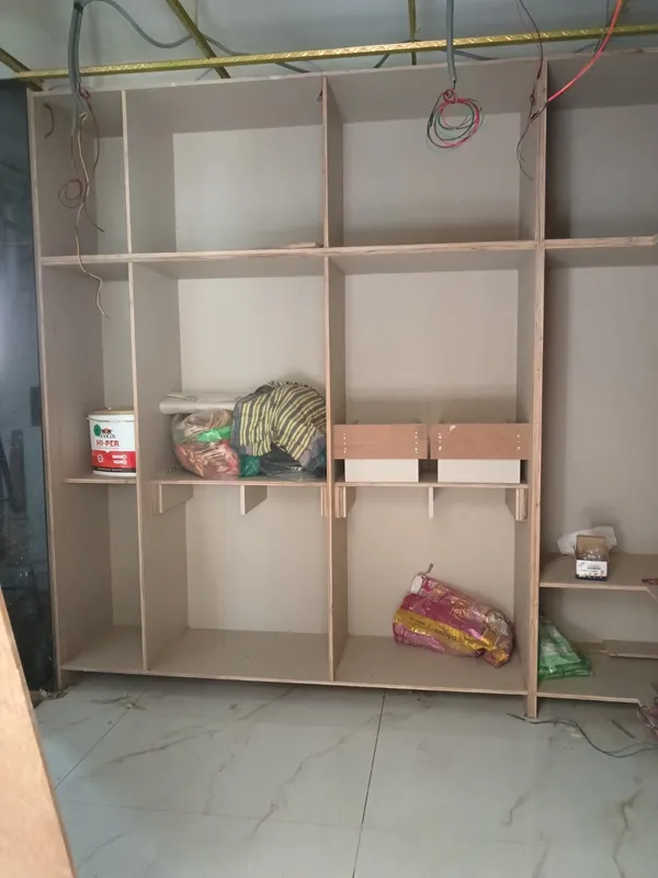 Internal electrical conduits and plywood wall framework ready for acoustic padding and veneer